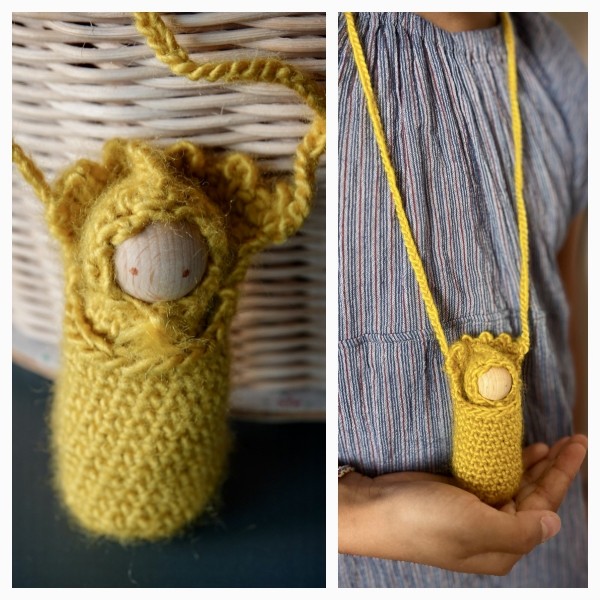 Beutelchen-Halskette mit Babypüppchen / Gelb